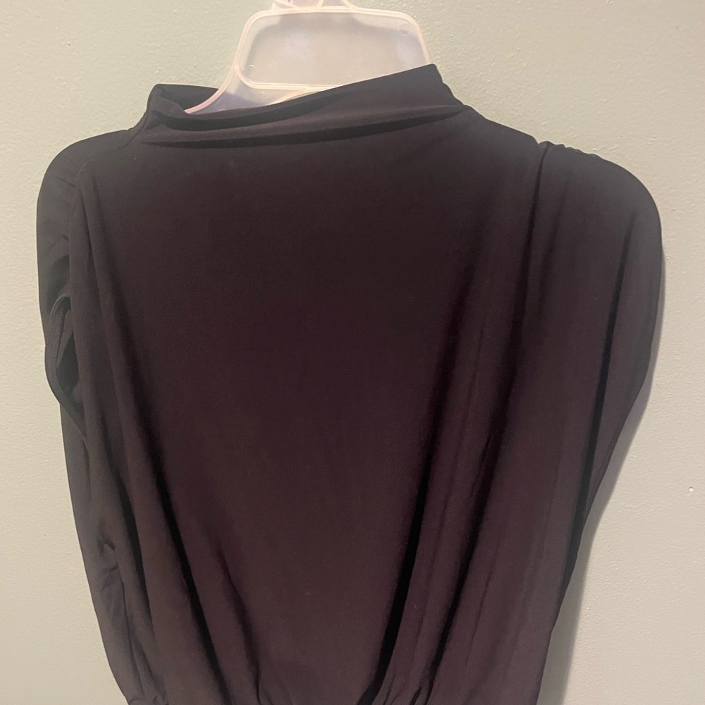 Black mock neck sleeveless top